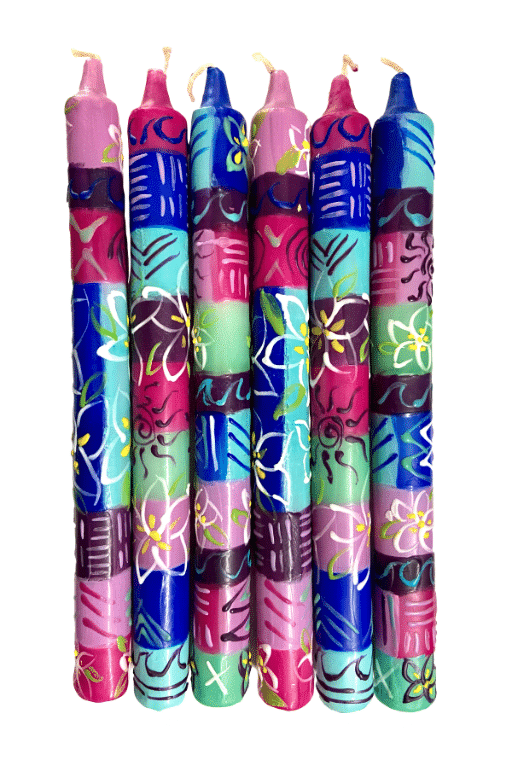 hand painted colorful shabbat candles made in the USA featuring culturally inspired patterns.
