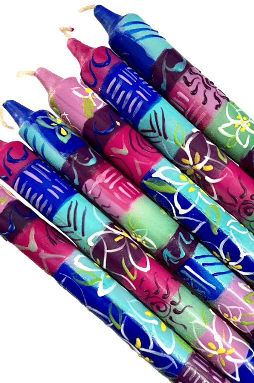 hand painted colorful shabbat candles made in the USA featuring culturally inspired patterns.